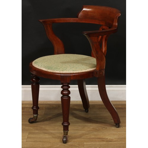 2209 - A Victorian mahogany desk chair, curved cresting rail, lyre-shaped splat, stuffed-over seat, turned ... 