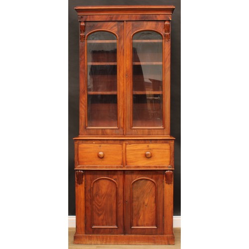 2210 - A Victorian mahogany library bookcase, moulded cornice above a pair of glazed doors enclosing three ... 