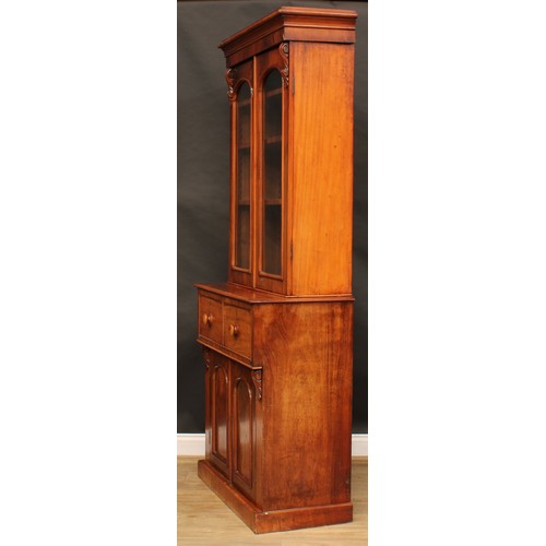 2210 - A Victorian mahogany library bookcase, moulded cornice above a pair of glazed doors enclosing three ... 