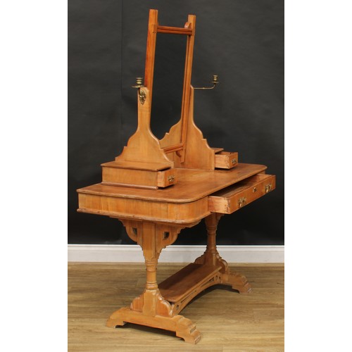 1839 - A late Victorian Aesthetic Movement beech dressing table, rectangular mirror flanked by brass candle... 