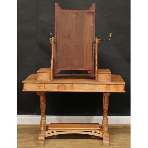 1839 - A late Victorian Aesthetic Movement beech dressing table, rectangular mirror flanked by brass candle... 