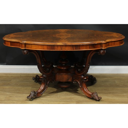 2285 - A Victorian walnut basket-base centre table, quarter-veneered burr top with moulded edge, S-scroll s... 