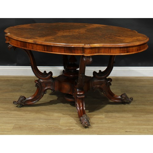 2285 - A Victorian walnut basket-base centre table, quarter-veneered burr top with moulded edge, S-scroll s... 