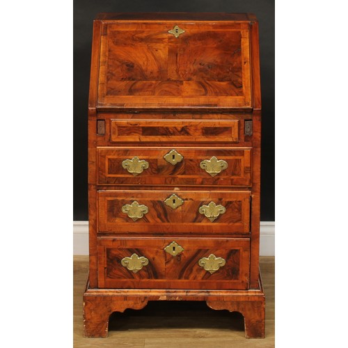 2425 - An 18th century design half-featherbanded walnut bureau, of small and neat proportions, fall front e... 