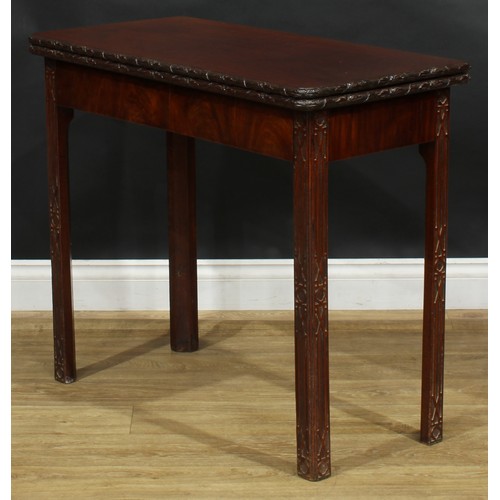 1704 - A 19th century mahogany tea table, in the Chinese Chippendale taste, hinged top with foliate carved ... 