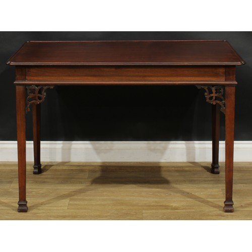 2127 - A George III Revival Irish mahogany silver table, dished rectangular top with reentrant angles, fret... 