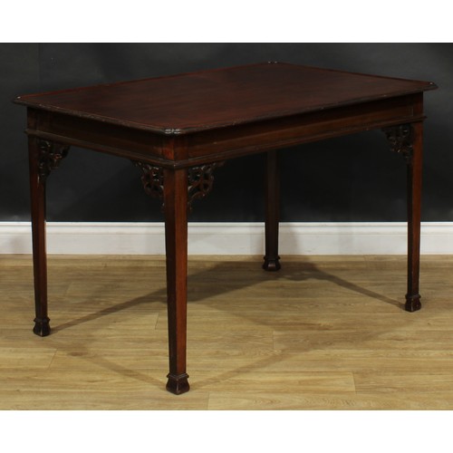 2127 - A George III Revival Irish mahogany silver table, dished rectangular top with reentrant angles, fret... 