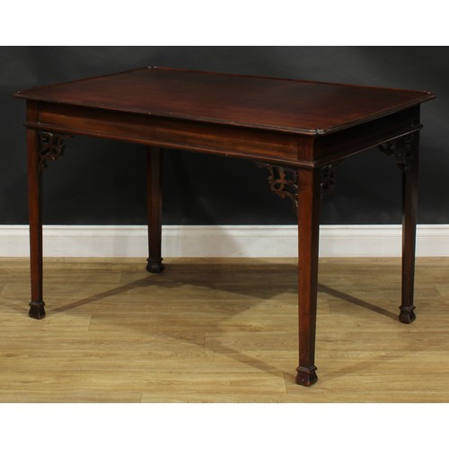 2127 - A George III Revival Irish mahogany silver table, dished rectangular top with reentrant angles, fret... 