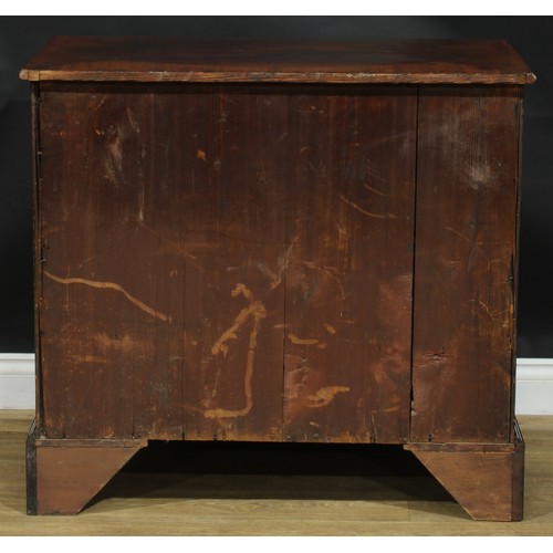 2116 - A George III mahogany bachelor’s chest, slightly oversailing top above a slide and four long graduat... 