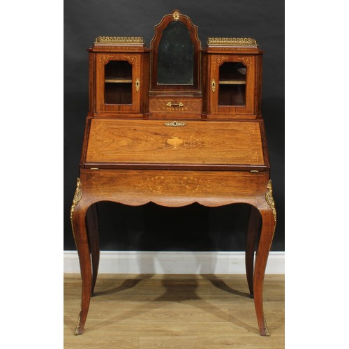 2516 - A Louis XV Revival Franglais rosewood and marquetry bureau de dame, shaped superstructure centred by... 