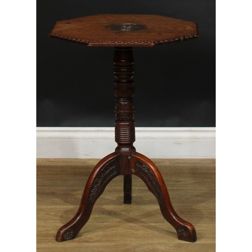 1713 - A 19th century oak tripod occasional table, possibly Masonic, octagonal top carved in relief with a ... 