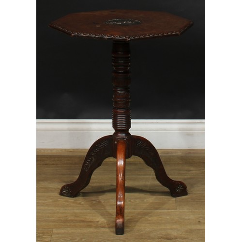 1713 - A 19th century oak tripod occasional table, possibly Masonic, octagonal top carved in relief with a ... 