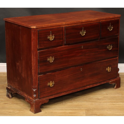 1624 - A 19th century mahogany chest, of three short and two long drawers, flanked by fluted canted angles,... 