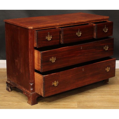 1624 - A 19th century mahogany chest, of three short and two long drawers, flanked by fluted canted angles,... 