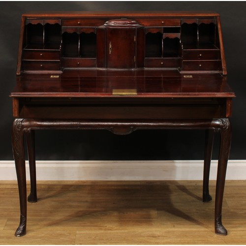 2104 - A George II Revival Scottish mahogany bureau on stand, by Muirhead Moffat & Co, Glasgow, the lock en... 