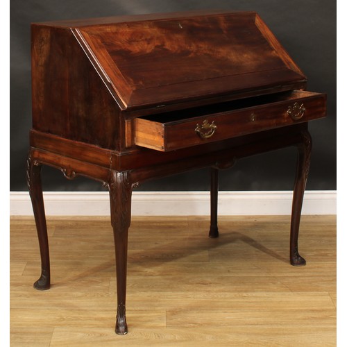 2104 - A George II Revival Scottish mahogany bureau on stand, by Muirhead Moffat & Co, Glasgow, the lock en... 