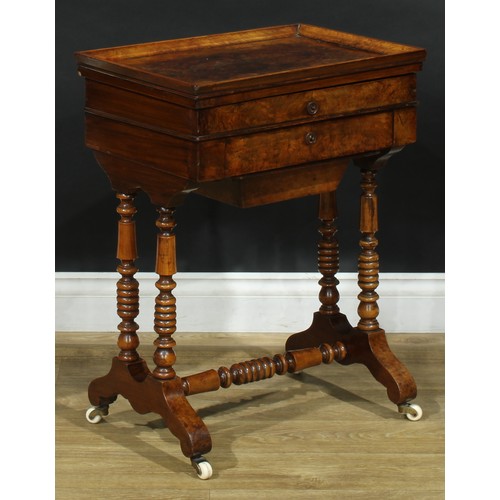 1835 - A late 19th century walnut work table, hinged top enclosing a mirror and compartmented interior abov... 