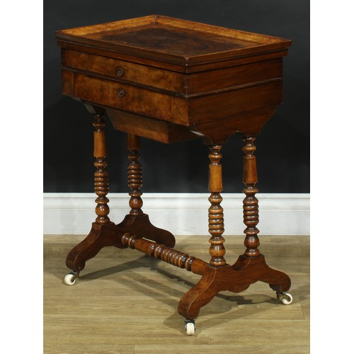 1835 - A late 19th century walnut work table, hinged top enclosing a mirror and compartmented interior abov... 