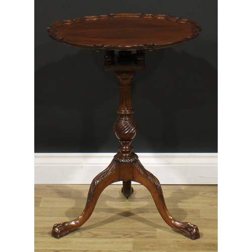 2477 - A George III Revival mahogany pie-crust birdcage tripod occasional table, tilting top, turned and fl... 