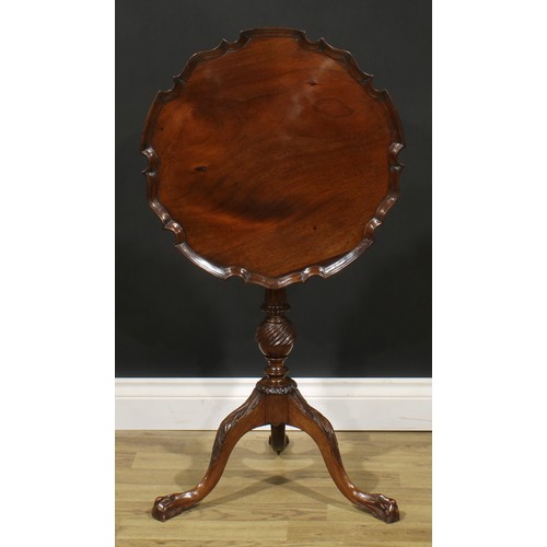 2477 - A George III Revival mahogany pie-crust birdcage tripod occasional table, tilting top, turned and fl... 