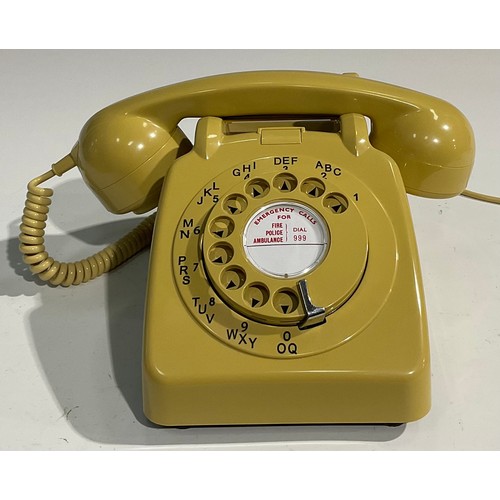 1552 - A 1960's G.P.O. rotary dial telephone, model 706L AEG67/2A, in teal; others similar, model 706L PXA ... 