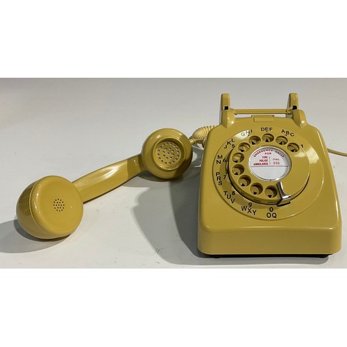 1552 - A 1960's G.P.O. rotary dial telephone, model 706L AEG67/2A, in teal; others similar, model 706L PXA ... 