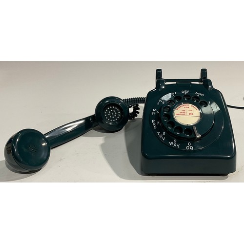 1552 - A 1960's G.P.O. rotary dial telephone, model 706L AEG67/2A, in teal; others similar, model 706L PXA ... 