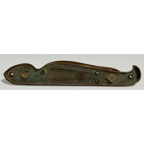 1824 - A pair of Art Nouveau bronze door pulls, the handles in typical sinuous form, on asymmetrical backpl... 