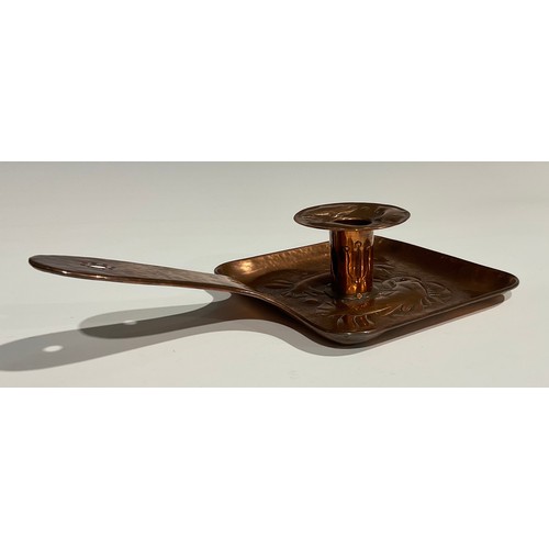 2348 - A Newlyn Arts & Crafts rounded rectangular pan shaped copper chamberstick, the drip pan and dish bas... 