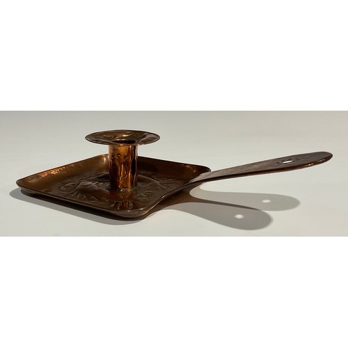 2348 - A Newlyn Arts & Crafts rounded rectangular pan shaped copper chamberstick, the drip pan and dish bas... 