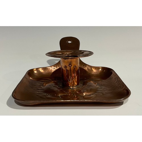 2348 - A Newlyn Arts & Crafts rounded rectangular pan shaped copper chamberstick, the drip pan and dish bas... 