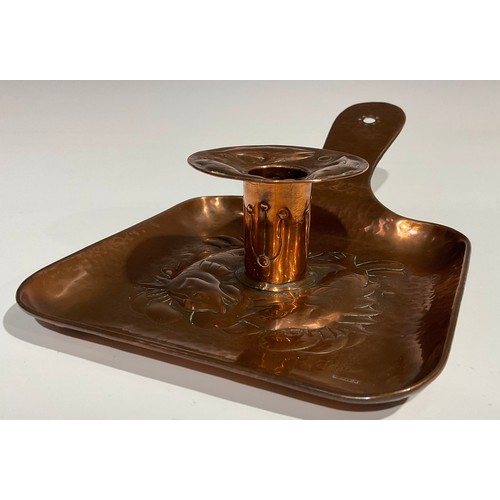 2348 - A Newlyn Arts & Crafts rounded rectangular pan shaped copper chamberstick, the drip pan and dish bas... 