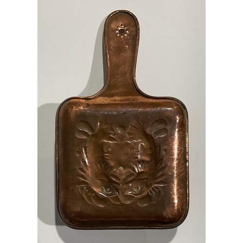 2348 - A Newlyn Arts & Crafts rounded rectangular pan shaped copper chamberstick, the drip pan and dish bas... 