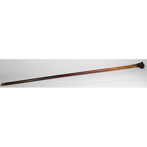 2505 - A late 19th century novelty automaton walking stick, the Black Forest type pommel carved as the head... 