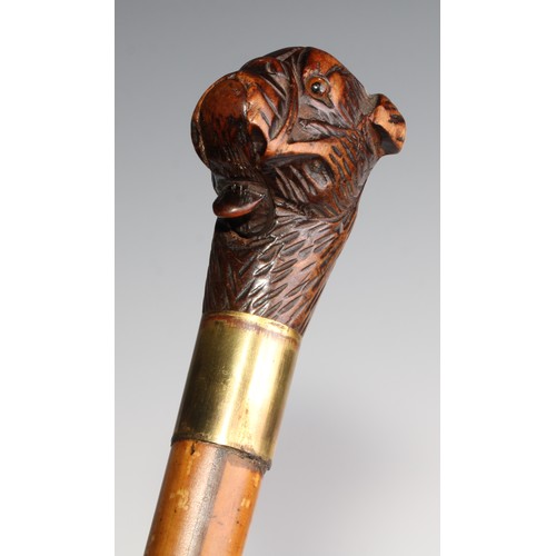 2505 - A late 19th century novelty automaton walking stick, the Black Forest type pommel carved as the head... 