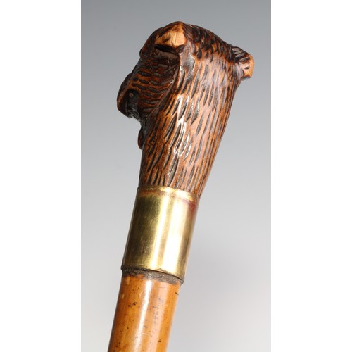 2505 - A late 19th century novelty automaton walking stick, the Black Forest type pommel carved as the head... 