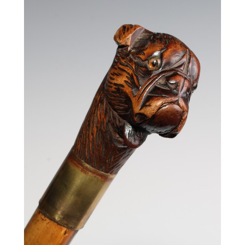 2505 - A late 19th century novelty automaton walking stick, the Black Forest type pommel carved as the head... 