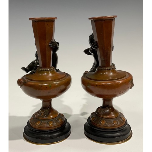 1770 - Auguste Moreau, after, a pair of bronze pedestal vases, each cast and applied with putti, the main b... 