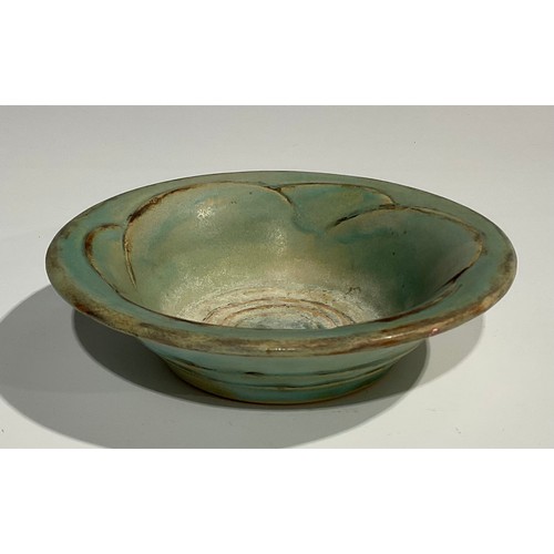 46 - A Denby Danesby Ware bowl, the inner moulded as a stylised flowerhead, glazed throughout in shades o... 