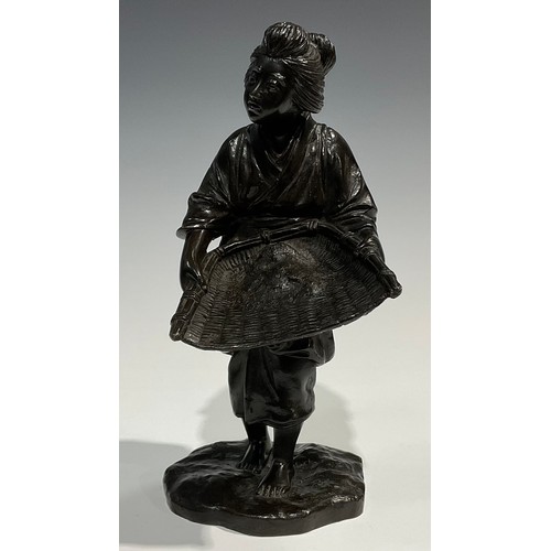 489 - Genryusai Seiya (Japanese School, Meiji Period), a brown patinated bronze, of a female holding rice ... 