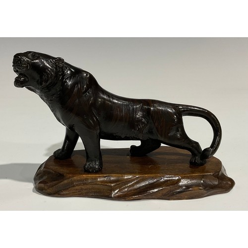 490 - Genryusai Seiya (Japanese School, Meiji Period), a brown patinated bronze, of a ferocious tiger, sig... 