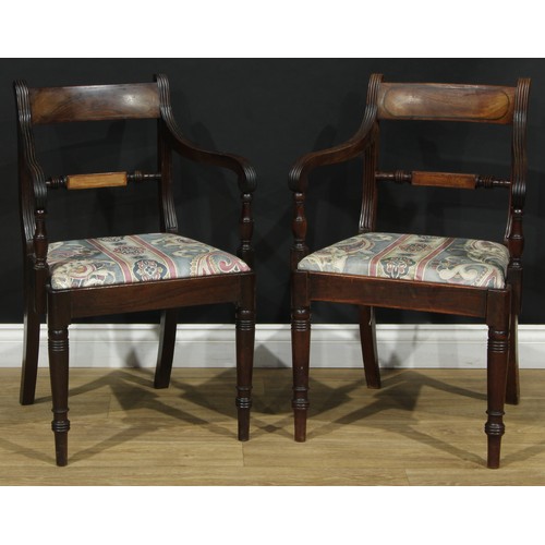 2214 - A set of eight Regency Revival mahogany Oxford bar-back dining chairs, comprising six side chairs an... 