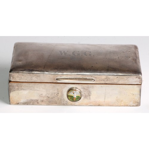 1068 - A silver rectangular cigarette box, slight domed cover engraved with W. G. G., the front with boss w... 