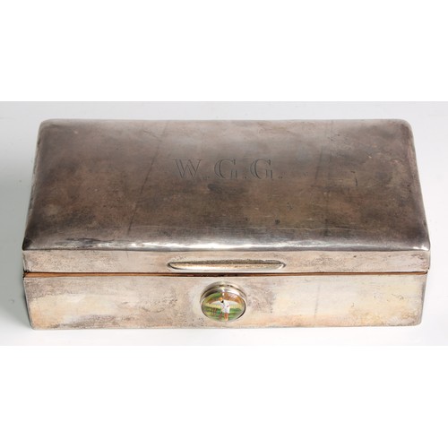 1068 - A silver rectangular cigarette box, slight domed cover engraved with W. G. G., the front with boss w... 