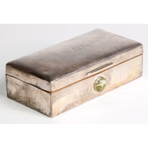 1068 - A silver rectangular cigarette box, slight domed cover engraved with W. G. G., the front with boss w... 