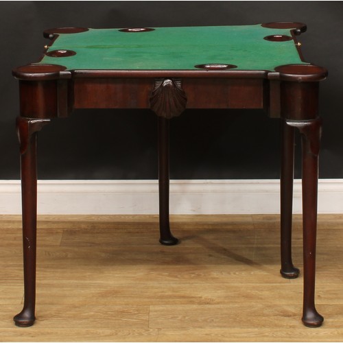 1731 - A George II Irish red walnut and mahogany card table, hinged top enclosing a baize lined playing sur... 