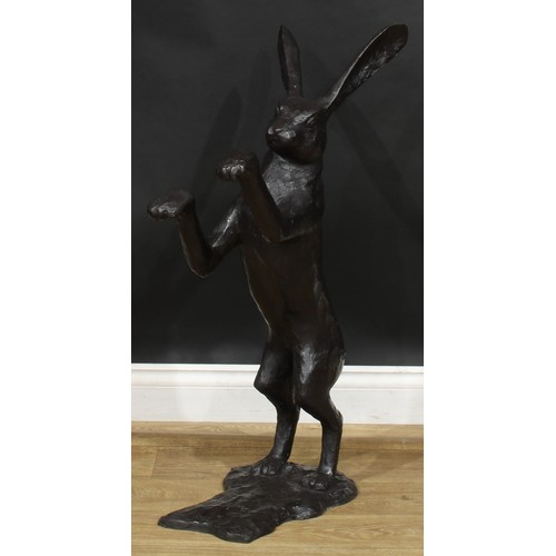 1764 - A pair of contemporary dark patinated bronze models, boxing hares, the largest 88.5cm high, the othe... 