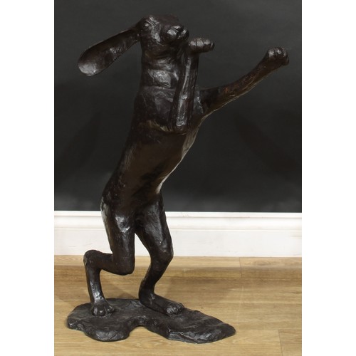 1764 - A pair of contemporary dark patinated bronze models, boxing hares, the largest 88.5cm high, the othe... 