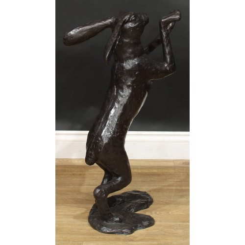 1764 - A pair of contemporary dark patinated bronze models, boxing hares, the largest 88.5cm high, the othe... 