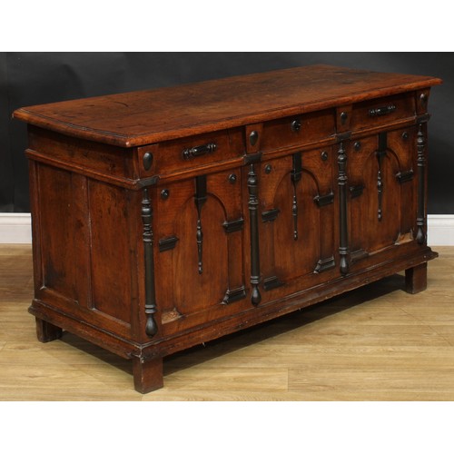 1999 - An 18th century oak and parcel-ebonised blanket chest, possibly Flemish, hinged top above a three pa... 